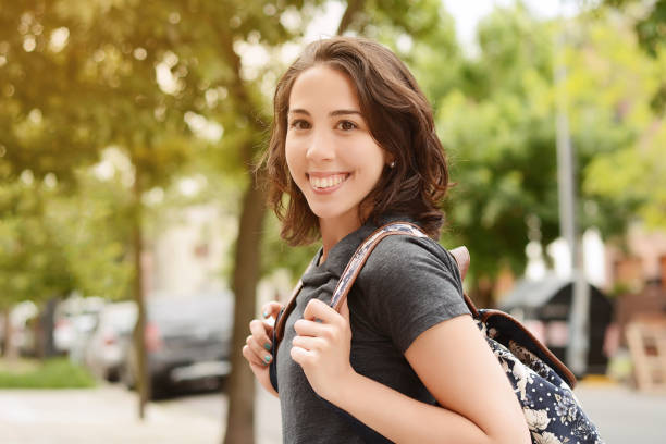 istock Portrait of young student girl with backpack 947096216