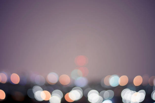 istock Colorful circles of light abstract background 947102374