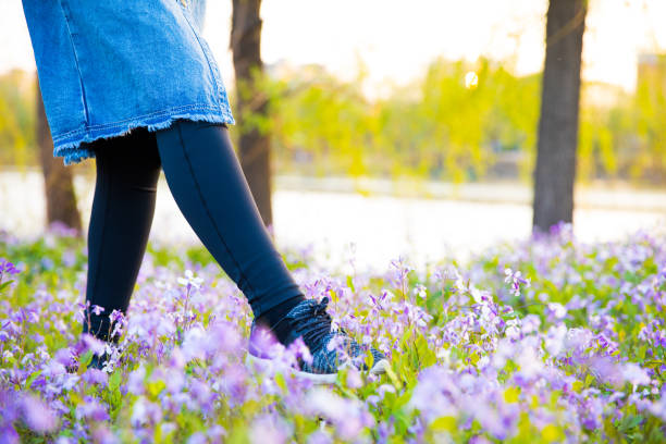 woman walking in meadow