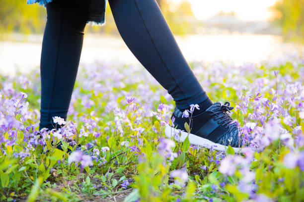 istock woman walking in meadow 947102622