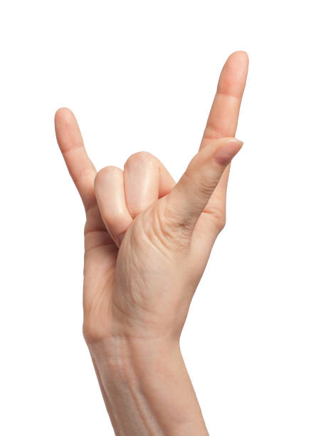 istock Man hand with Rock and Roll sign isolated on white background 947107836