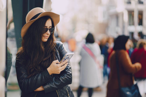 istock girl with phone in istanbul 947111300
