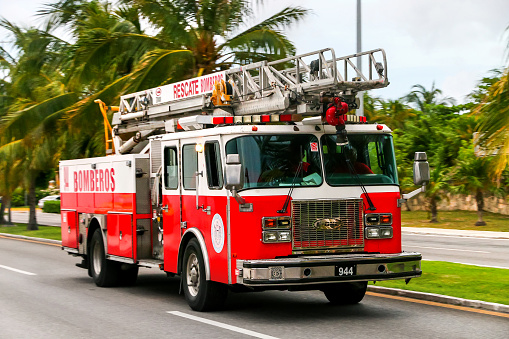 CANCUN, MEXICO - JUNE 4, 2017: Fire ladder E-One in the city street.