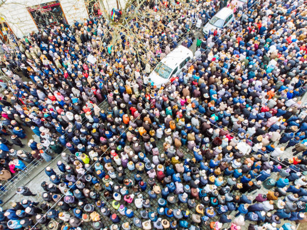 istock above view on crowd. big amount of people. 947120370