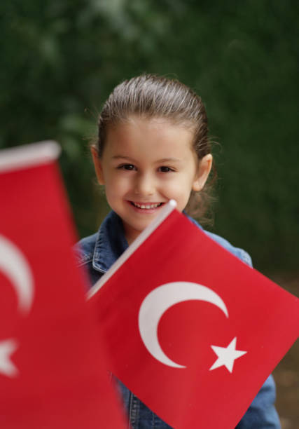 istock Little Girl With Turkish Flags 947124912