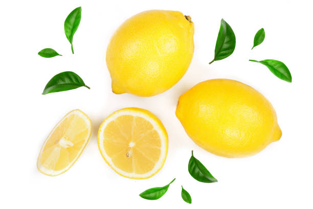 istock lemon and slices with leaf isolated on white background. Flat lay, top view 947127652