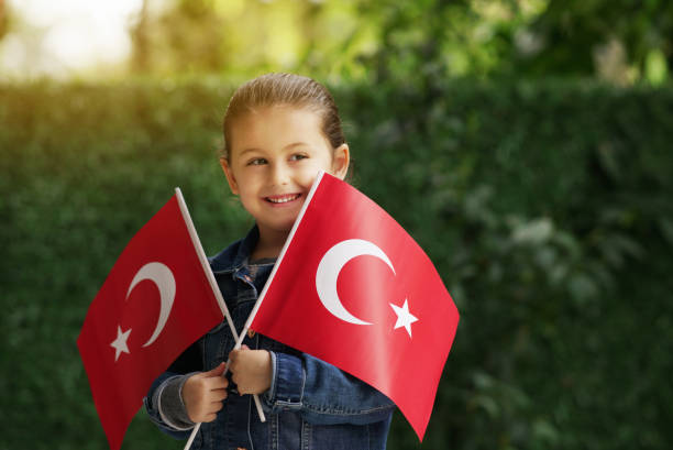istock Little Girl With Turkish Flags 947128080