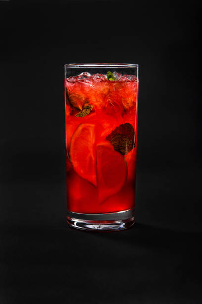 istock Summer cocktail on isolated black background 947128230