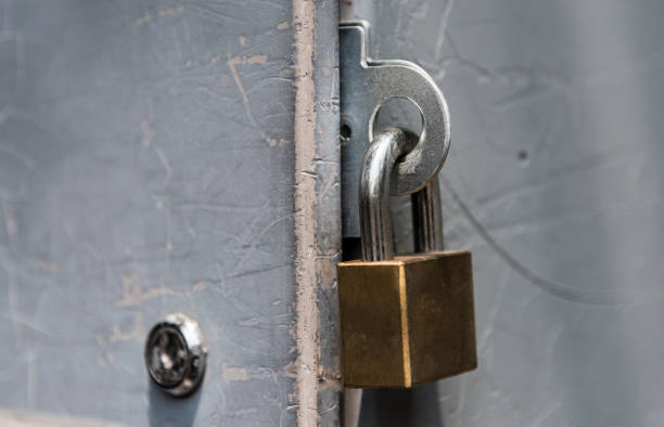 istock Closeup of a locked padlock 947132676