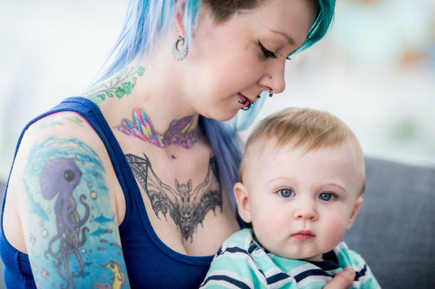 istock Sitting With Baby Boy 947140388