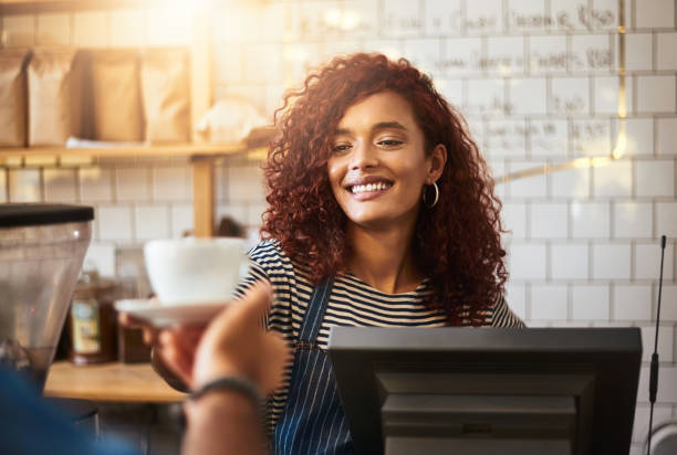istock Serving cups of happiness to customers 947144812