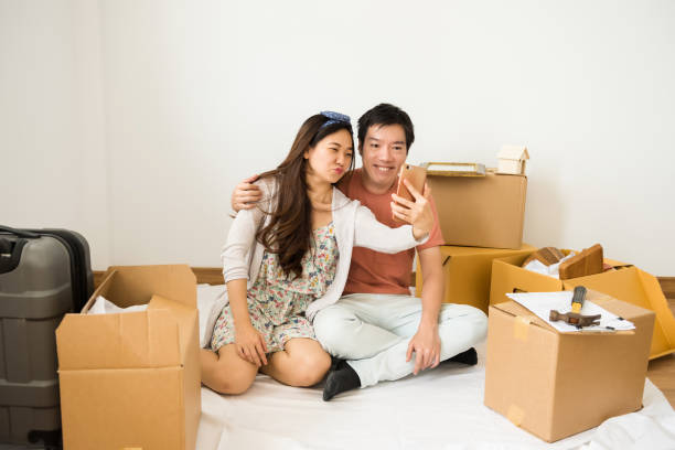 istock happy couple selfie in new home 947147908