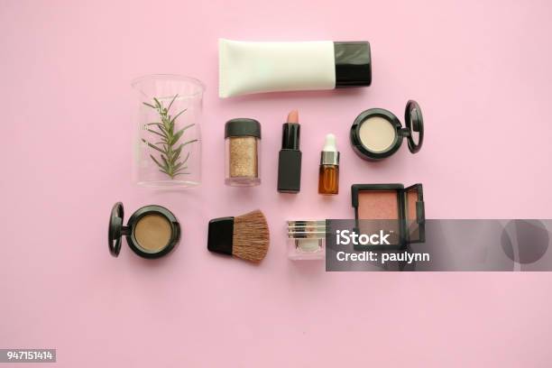 Natural Cosmetic Makeup Organic Skincare Serum Product Packaging With Leaves Herb On Nature Beauty Concept Herb Bio And Spa Conceptpink Background Stock Photo - Download Image Now