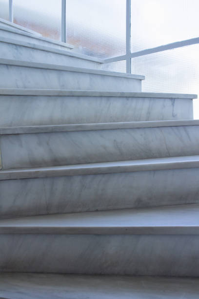istock Geometrical pattern background of light gray stone marble stairs 947152688
