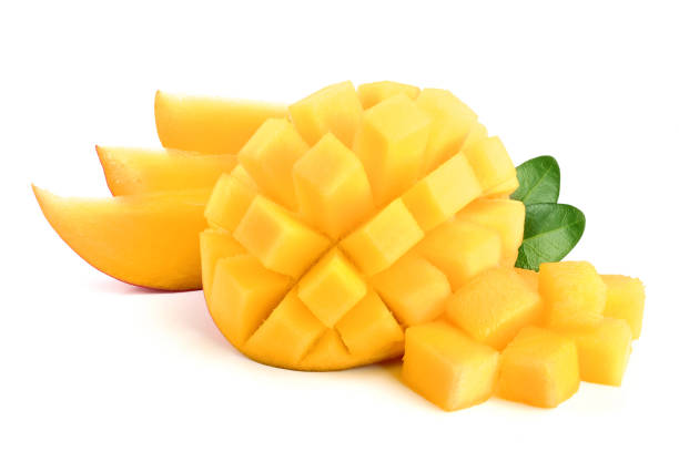 istock Mango fruit half with leaves and slices isolated on white background close-up 947156332
