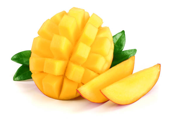istock Mango fruit half with leaves and slices isolated on white background close-up 947156358