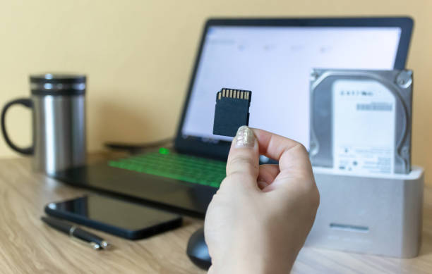 istock Back up data to a hard drive of hdd docking 947157602
