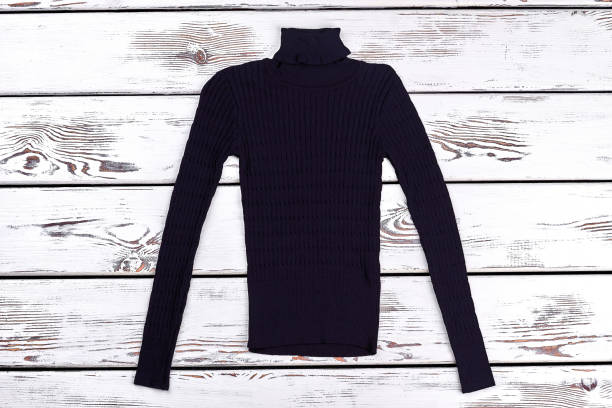 istock Boys black turtleneck warm sweater. 947163262