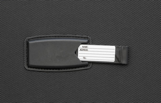 istock luggage tag, gray abstract background 947163472