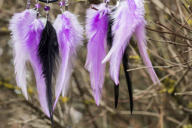 istock earrings of Handmade dream catcher with feathers threads and beads rope hanging 947163868