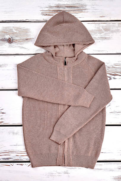 New hooded brown knitted sweater.