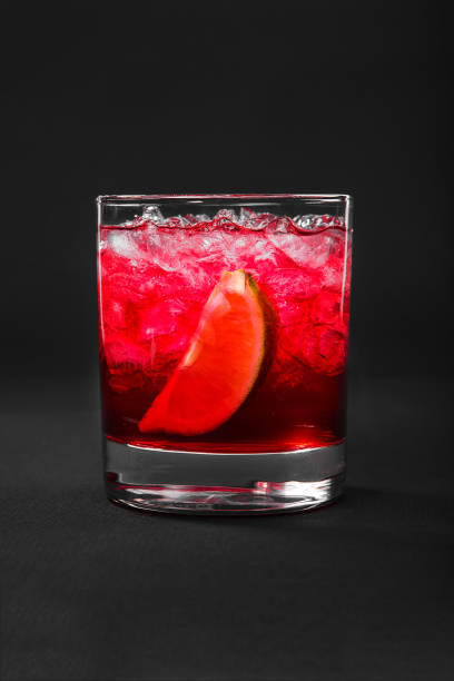istock Summer cocktail on isolated black background 947173154