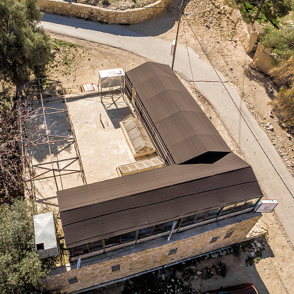 Dana, Jordan, March 10th, 2018: Aerial view of the village Dana and the hotel dana castle in the Biosphere Reserve of Dana in Jordan, made with drone