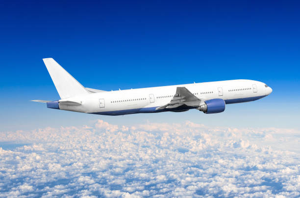 istock Passenger airplane flying travel, trip at flight level over the white clouds. 947174760