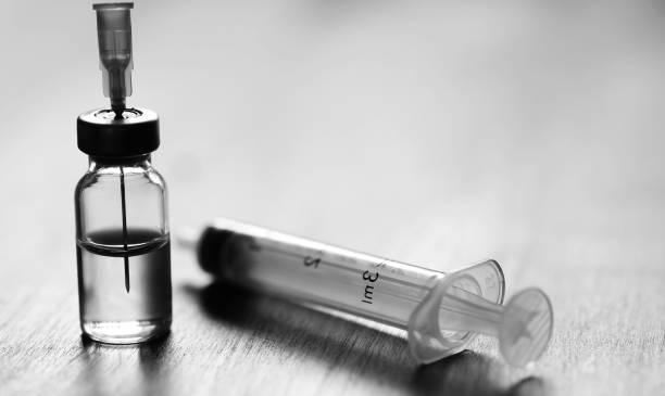istock Ampoule and needles from a medical syringe 947175454