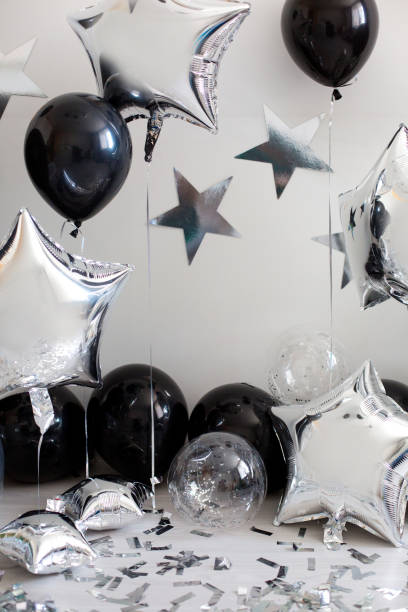 istock silver with black baby birthday decoration 947178188