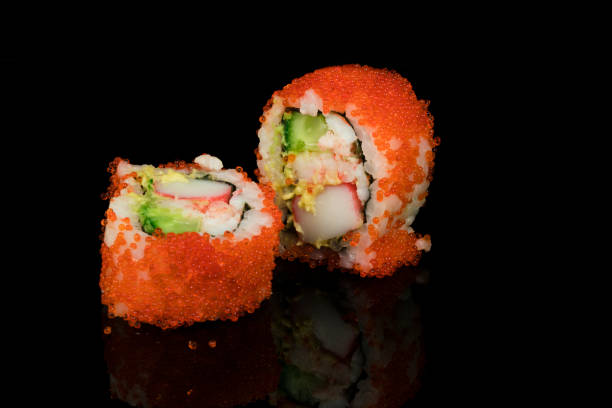 istock varieties of sushi on black background 947189074