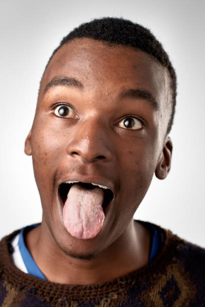 istock Studio portrait of African man making silly fun expression 947189280