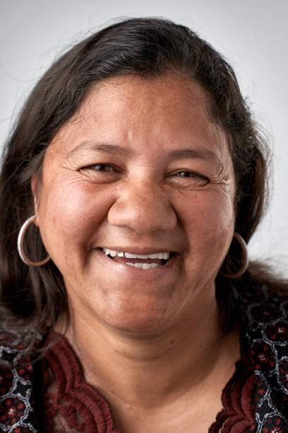 istock Studio portrait of mixed race woman smiling 947189362