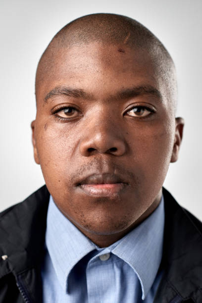 istock ID passport portrait of African man with serious expression 947200814