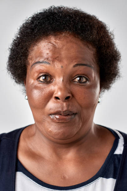 istock Studio portrait of African woman making silly expression 947201096