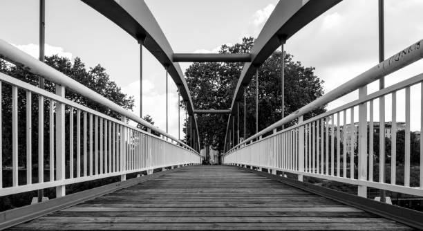 istock Empty Footbridge Amidst Railing In City 947201132