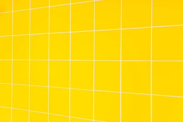 istock Yellow ceramic tiles background in bathroom 947202264
