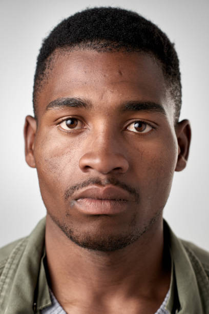 istock ID passport portrait of African man with serious expression 947202368