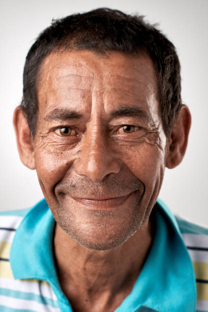 istock Studio portrait of mature mixed race man smiling 947202628