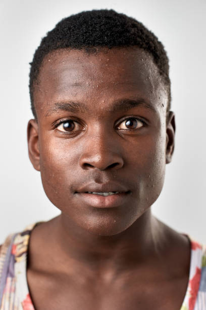 istock Passport ID portrait of African man with blank serious expression 947202774