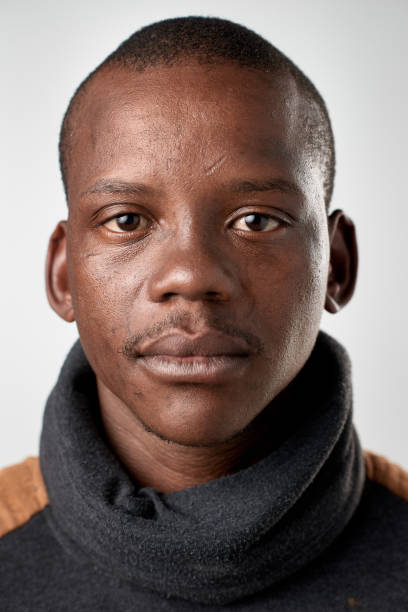istock Passport ID portrait of African man with blank serious expression 947205462