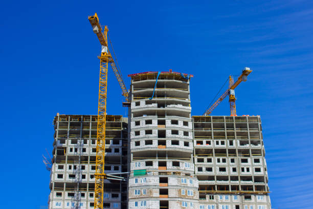 istock Construction of a high-rise building. Huge Crane 947205830