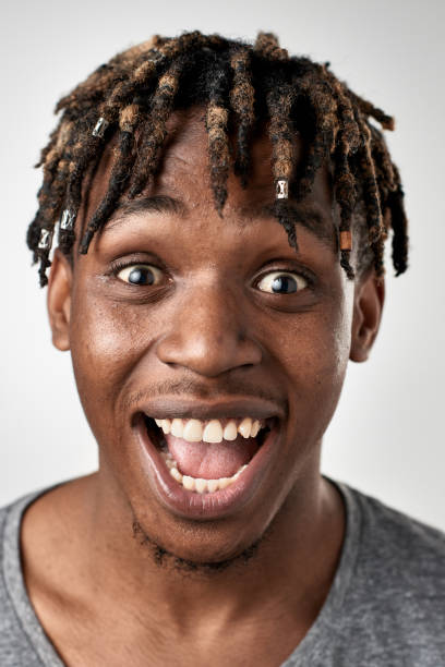 istock Studio portrait of African man making silly fun expression 947212262