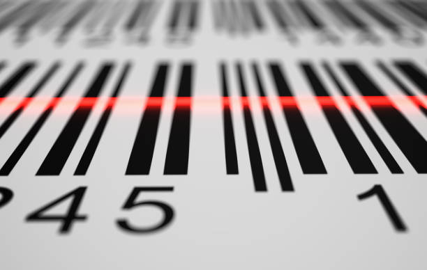 istock Close-up view on red laser is scanning label with barcode on product. 3D rendered illustration. 947217732