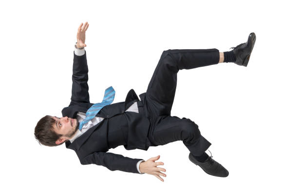 istock Businessman is falling down. Isolated on white background. 947219990