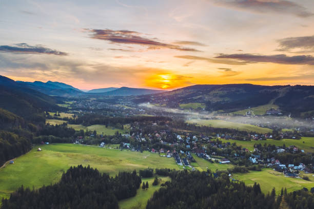 istock Scenic View Of Landscape Against Sky At Sunset 947220020