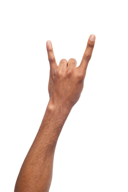 istock Male black hand making rock'n'roll gesture isolated on white 947223846