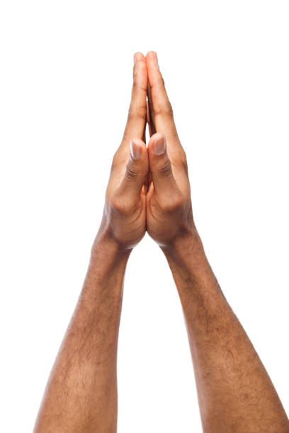 istock Black male praying hands gesture 947223924