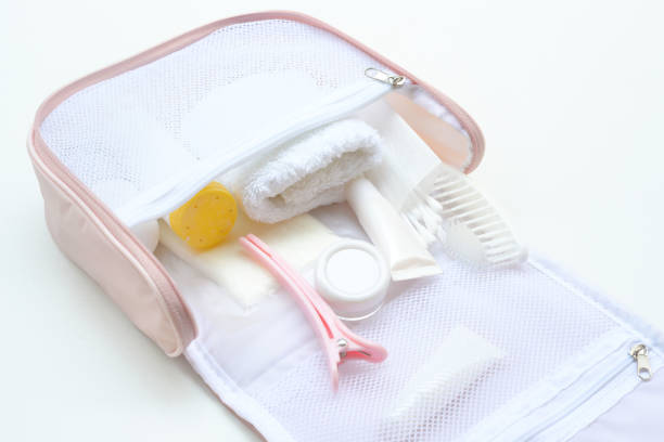 istock Shower set and towel in small bath bag. 947224036