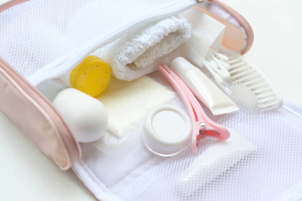 istock Shower set and towel in small bath bag. 947224118